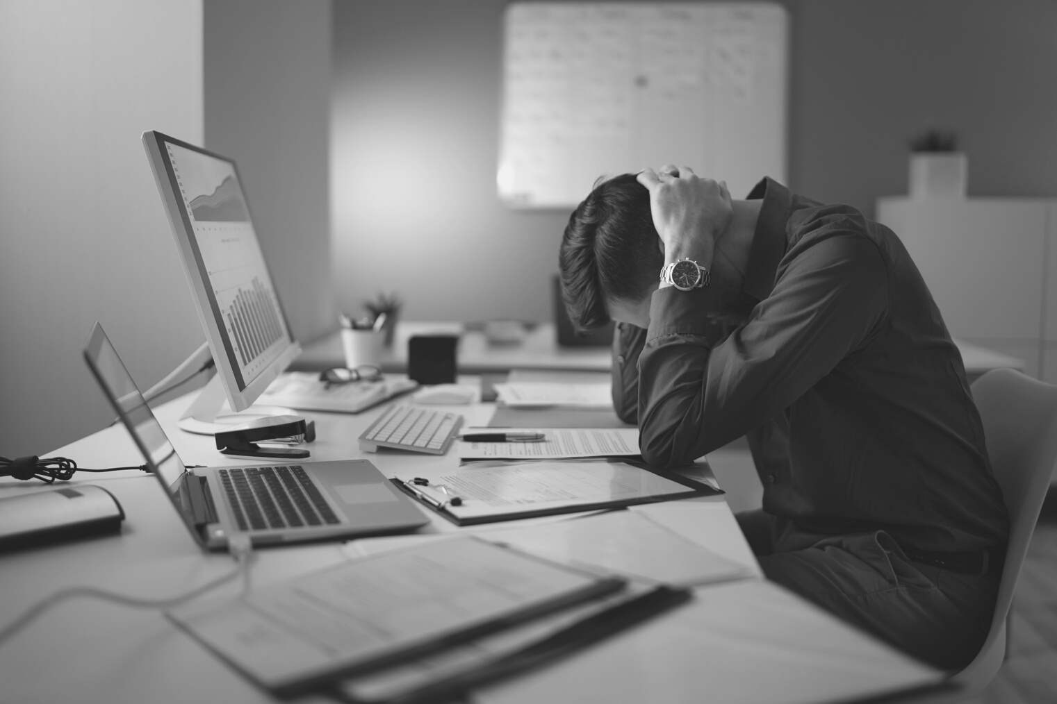 Stressed Accountant Working Late In Office